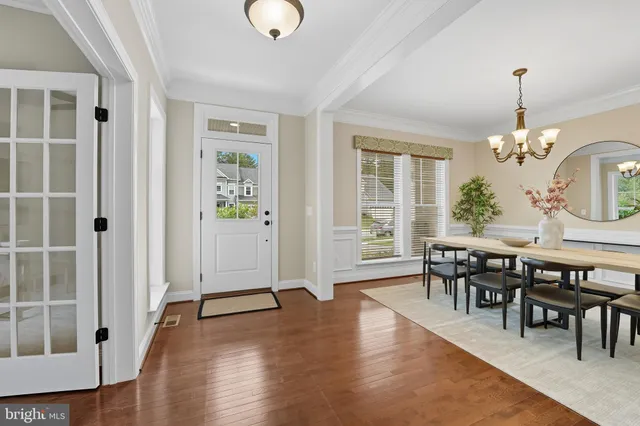 a view of a livingroom with furniture and wooden floor