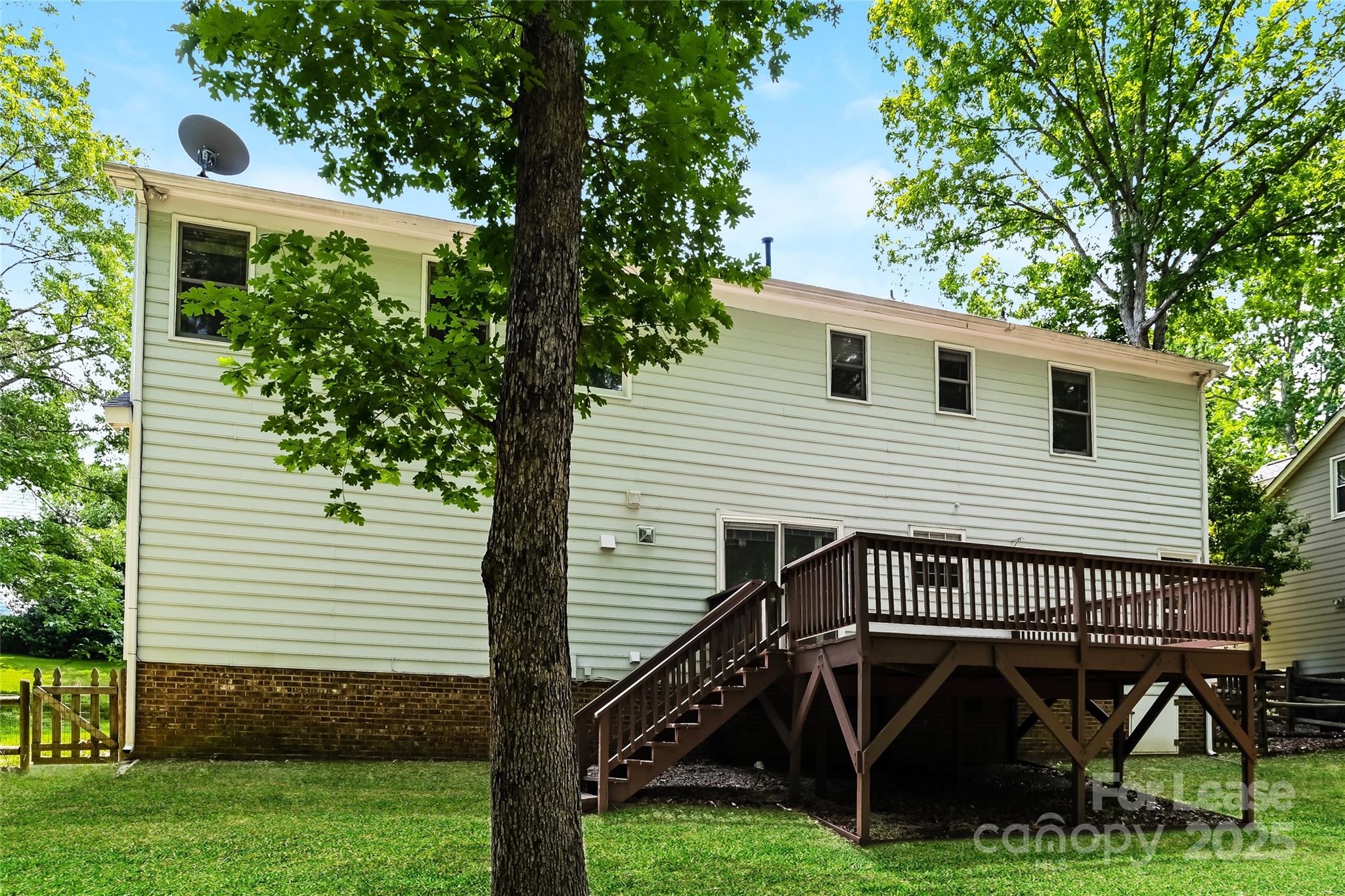 2331 Hunters Bluff Drive Matthews, NC 28105 - Photo 14 of 17 a view of backyard with deck and garden