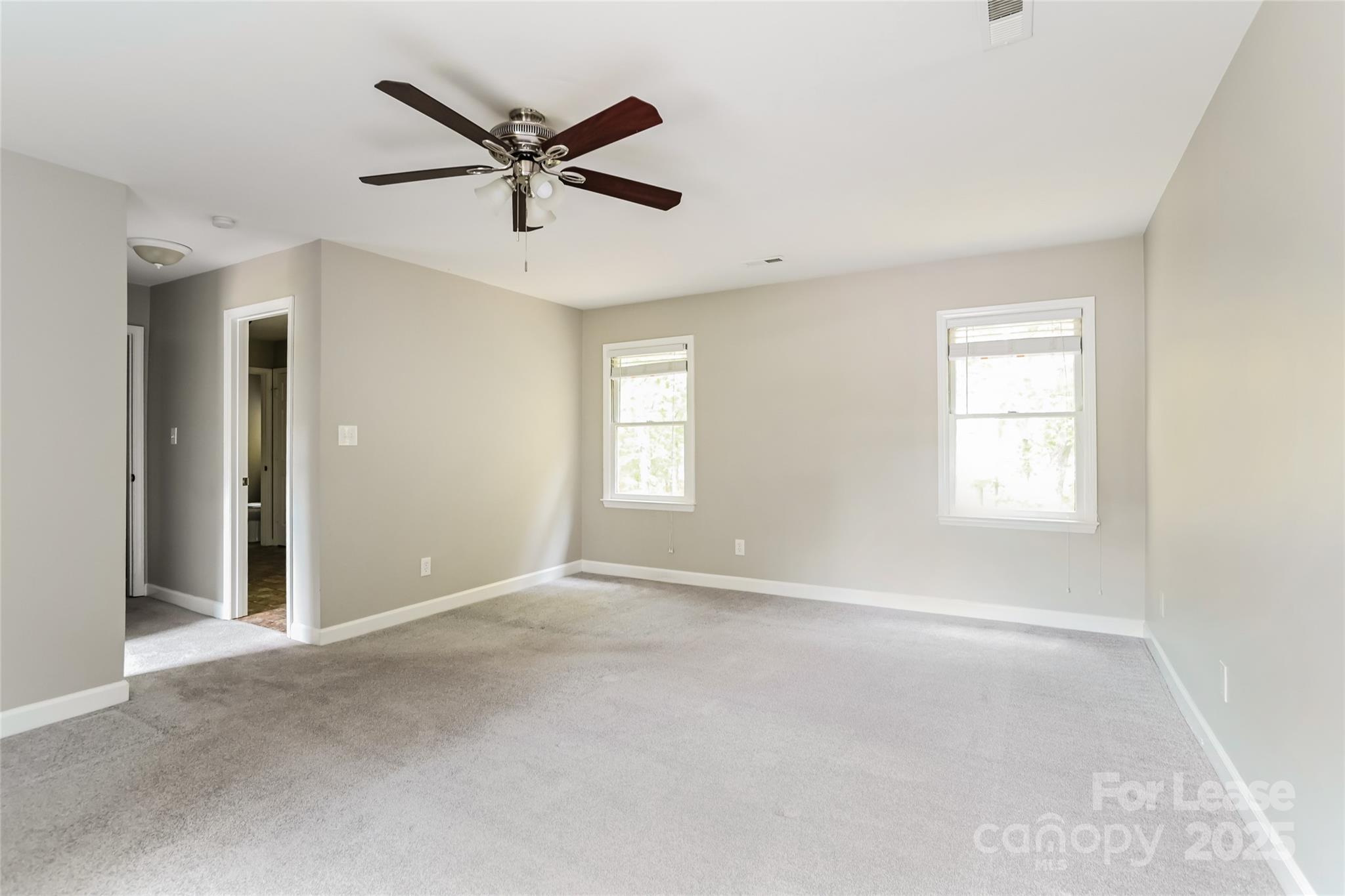2331 Hunters Bluff Drive Matthews, NC 28105 - Photo 7 of 17 a view of an empty room with a window