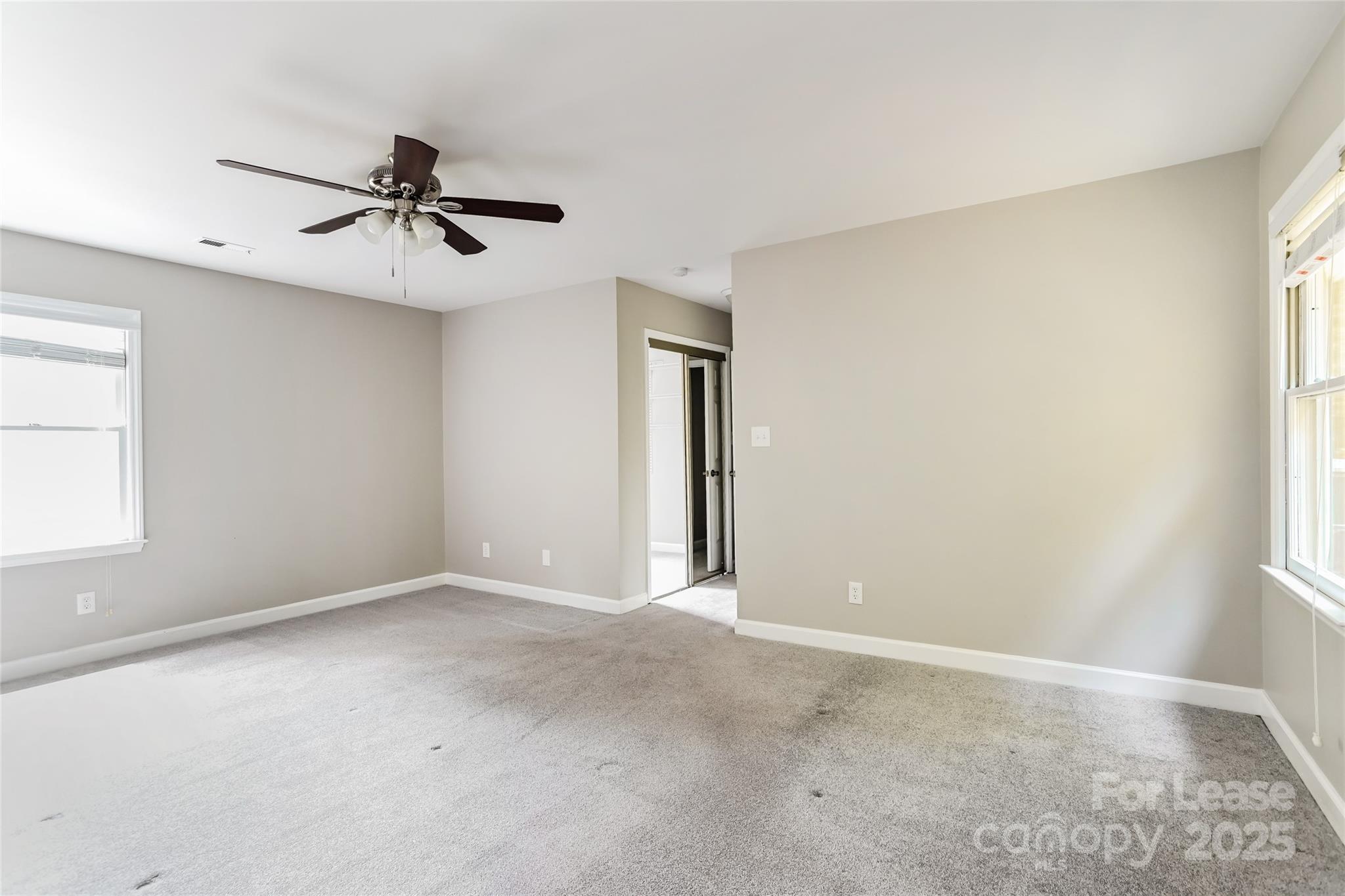 2331 Hunters Bluff Drive Matthews, NC 28105 - Photo 8 of 17 a view of an empty room with a window