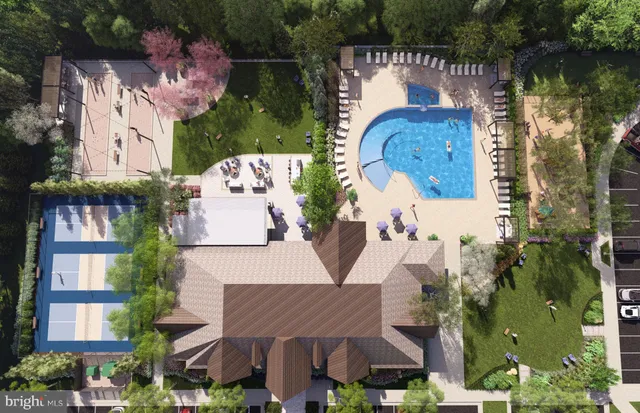 an aerial view of a house with swimming pool garden and patio