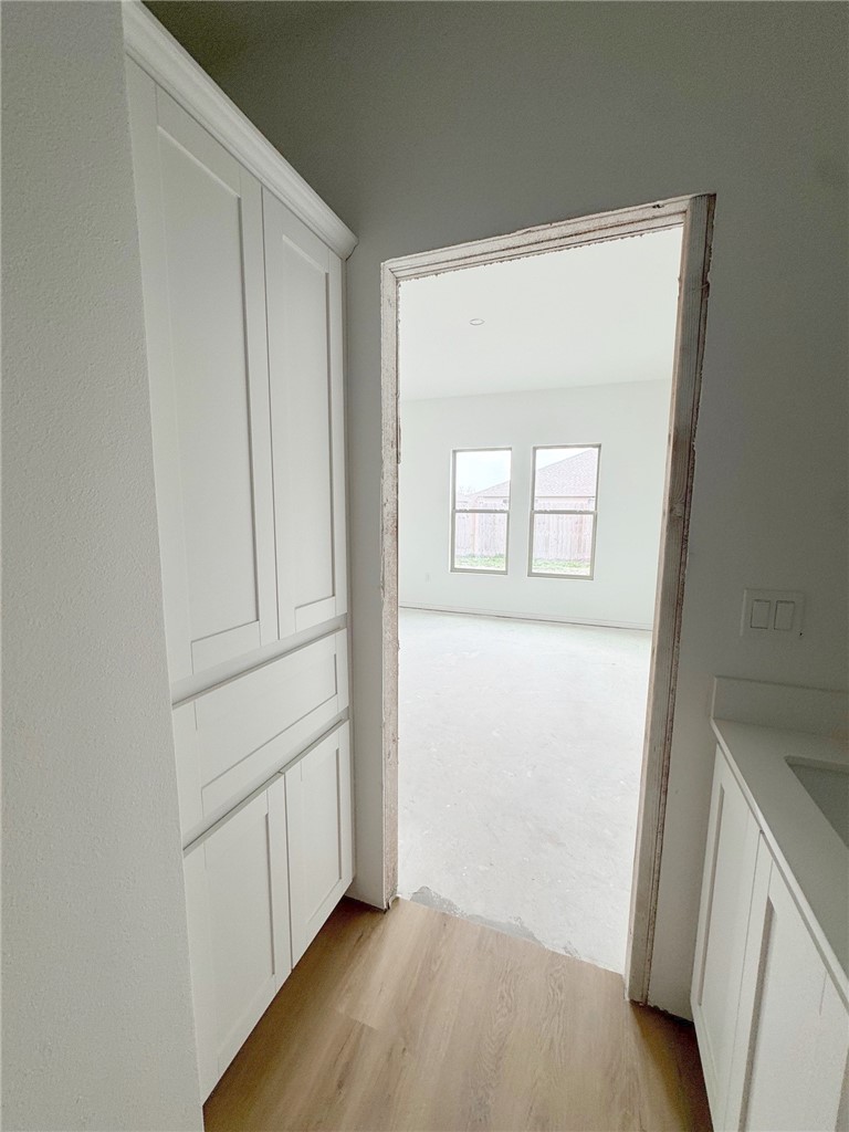 2105 Fury Portland, TX 78374 - Photo 21 of 23 a view of empty room with wooden floor