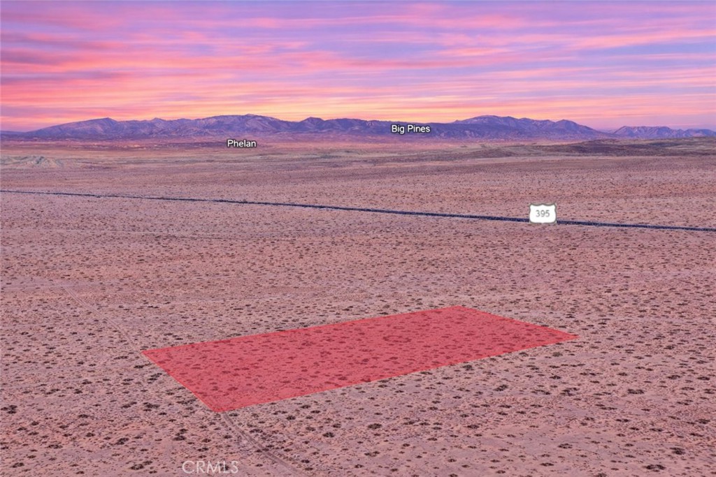 a view of an outdoor space with a mountain