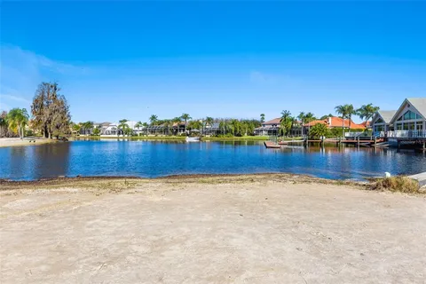 a view of a yard and front view of a house