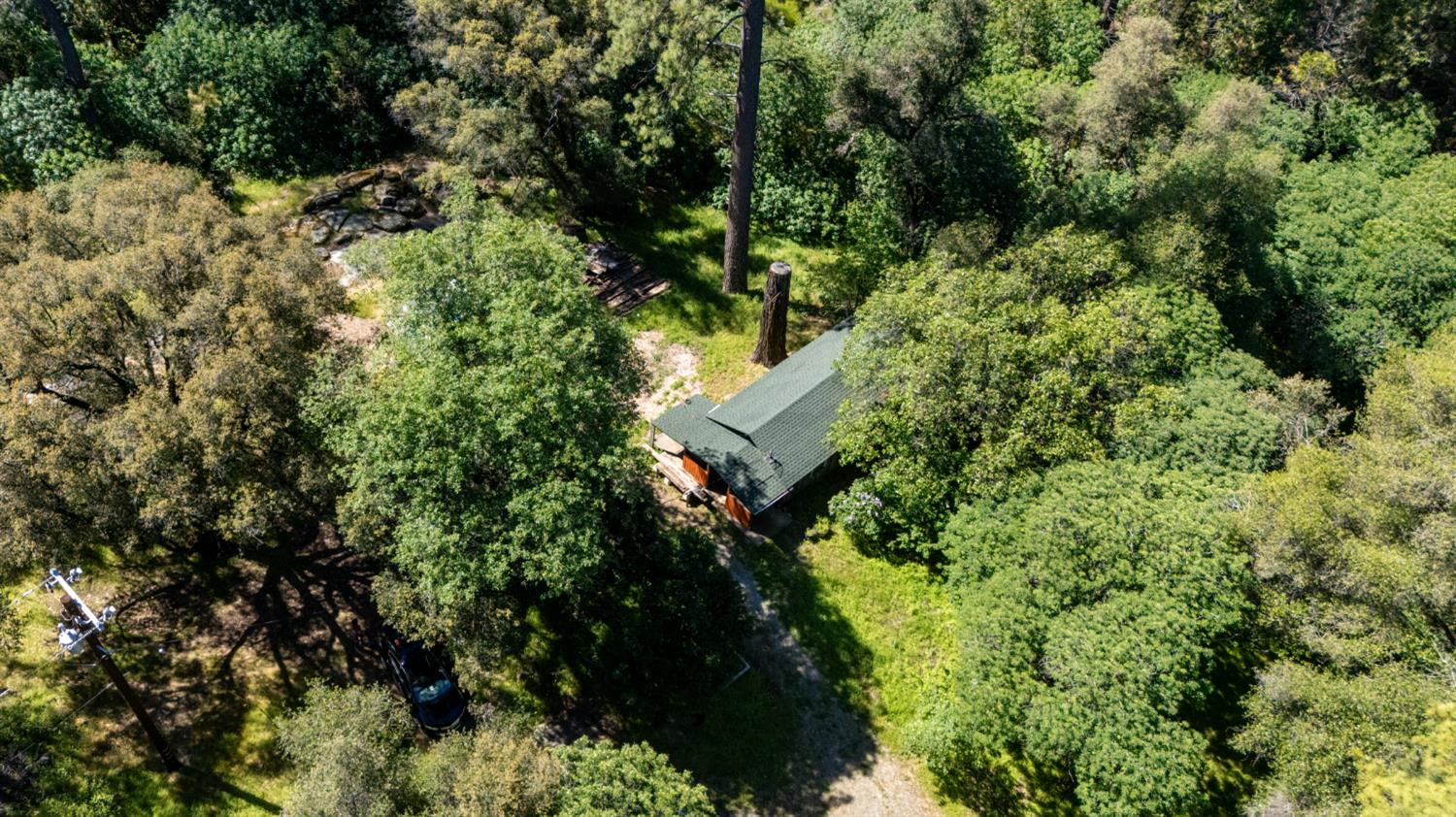 7220 Grizzly Flat Road Somerset, CA 95684 - Photo 21 of 28 an aerial view of a house with a yard