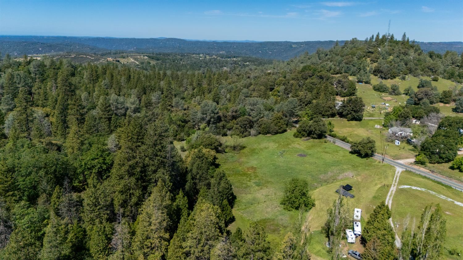 7220 Grizzly Flat Road Somerset, CA 95684 - Photo 26 of 28 a view of a forest with a lake