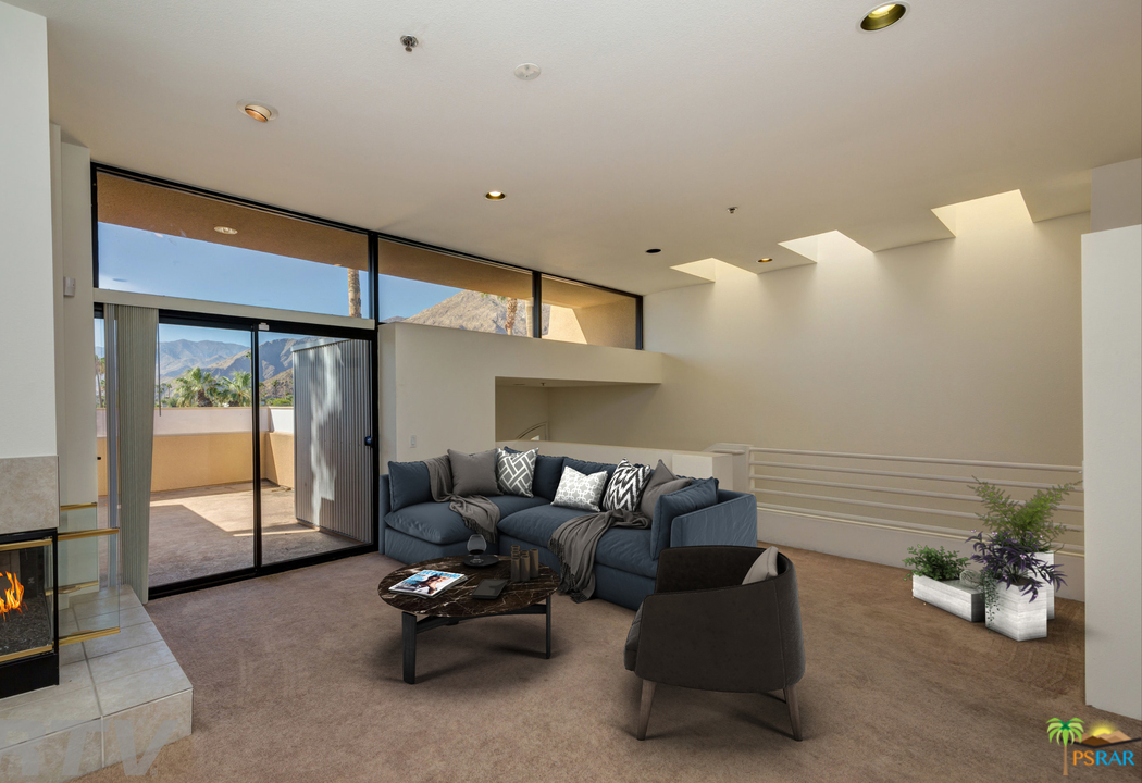 100 East Stevens Road, Unit 509 Palm Springs, CA 92262 - Photo 1 of 37 a living room with furniture
