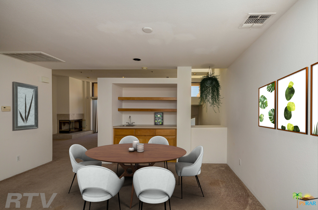 100 East Stevens Road, Unit 509 Palm Springs, CA 92262 - Photo 11 of 37 a view of a dining room with furniture and window