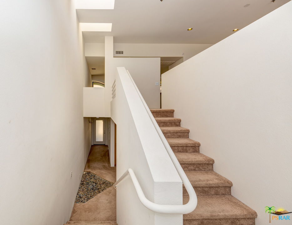 100 East Stevens Road, Unit 509 Palm Springs, CA 92262 - Photo 17 of 37 a view of entryway and hall with wooden floor