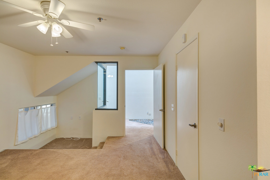 100 East Stevens Road, Unit 509 Palm Springs, CA 92262 - Photo 20 of 37 wooden floor in an empty room