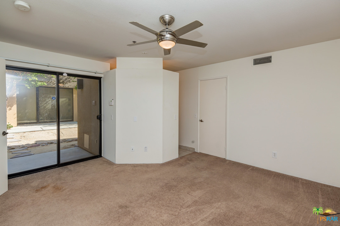 100 East Stevens Road, Unit 509 Palm Springs, CA 92262 - Photo 24 of 37 an empty room with ceiling fan and window