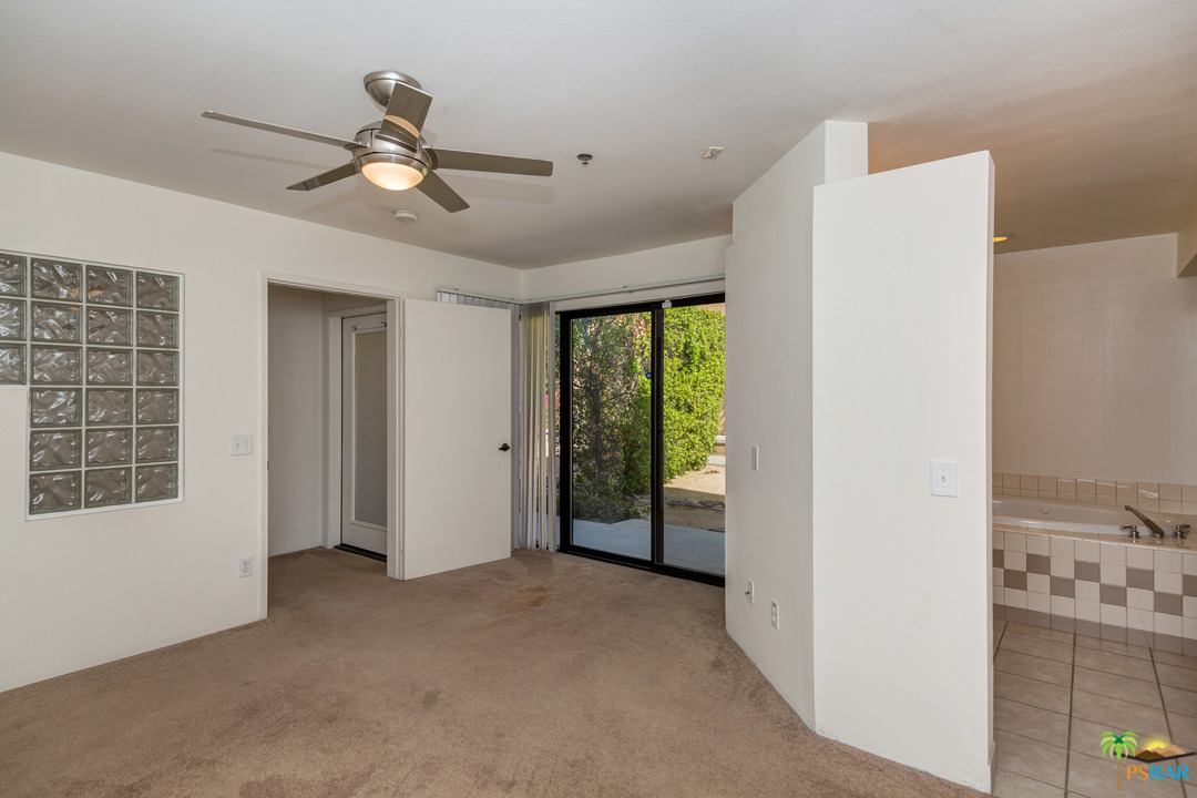 100 East Stevens Road, Unit 509 Palm Springs, CA 92262 - Photo 26 of 37 a view of a livingroom with a ceiling fan and window
