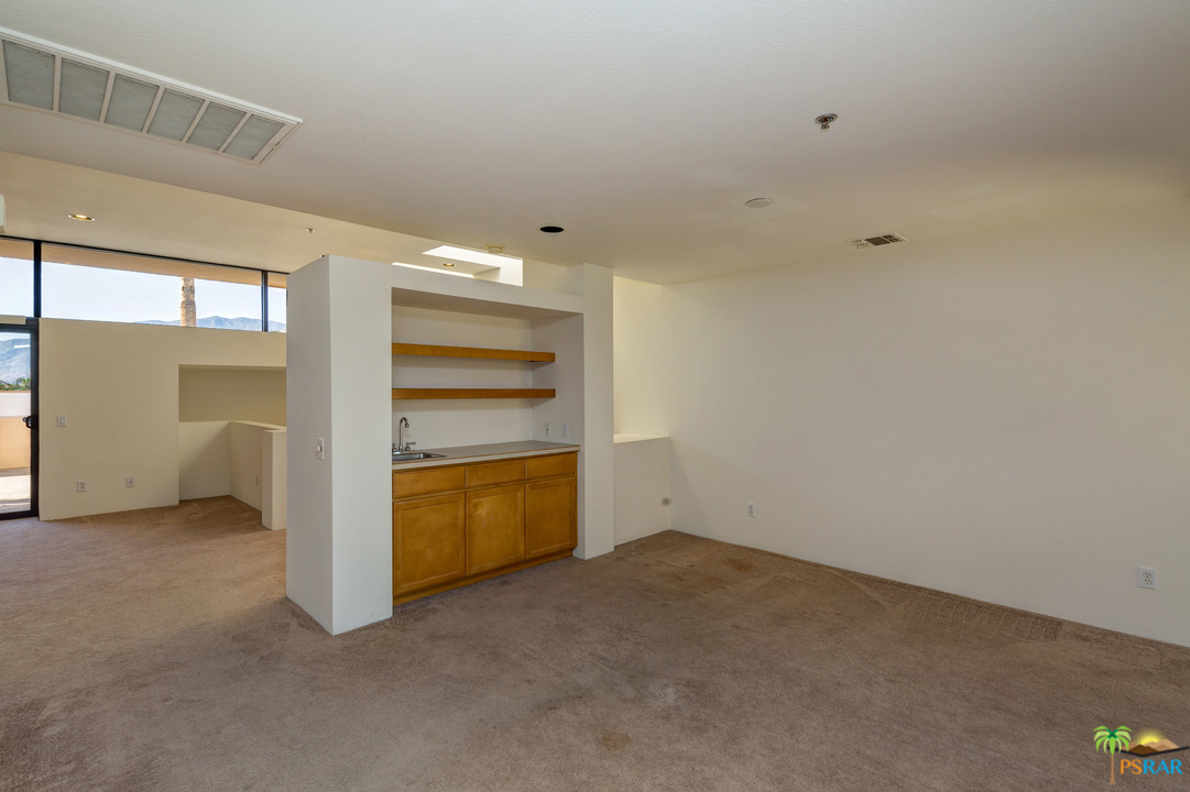 100 East Stevens Road, Unit 509 Palm Springs, CA 92262 - Photo 9 of 37 a view of an empty room and a window