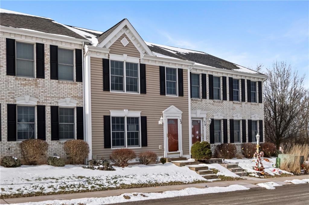 32 Castle View Drive McKees Rocks, PA 15136 - Photo 2 of 34 a view of a building with a yard in front of it