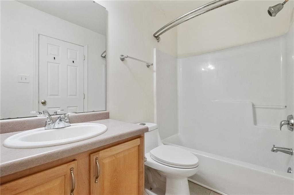 32 Castle View Drive McKees Rocks, PA 15136 - Photo 26 of 34 a bathroom with a sink a toilet and shower