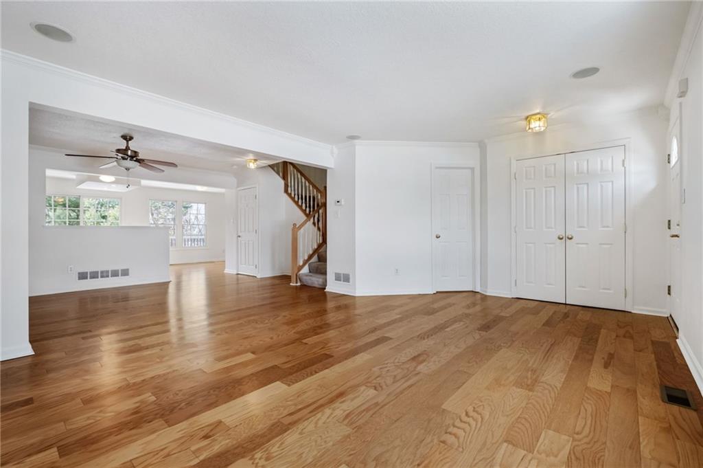 32 Castle View Drive McKees Rocks, PA 15136 - Photo 7 of 34 a view of empty room with wooden floor and fan