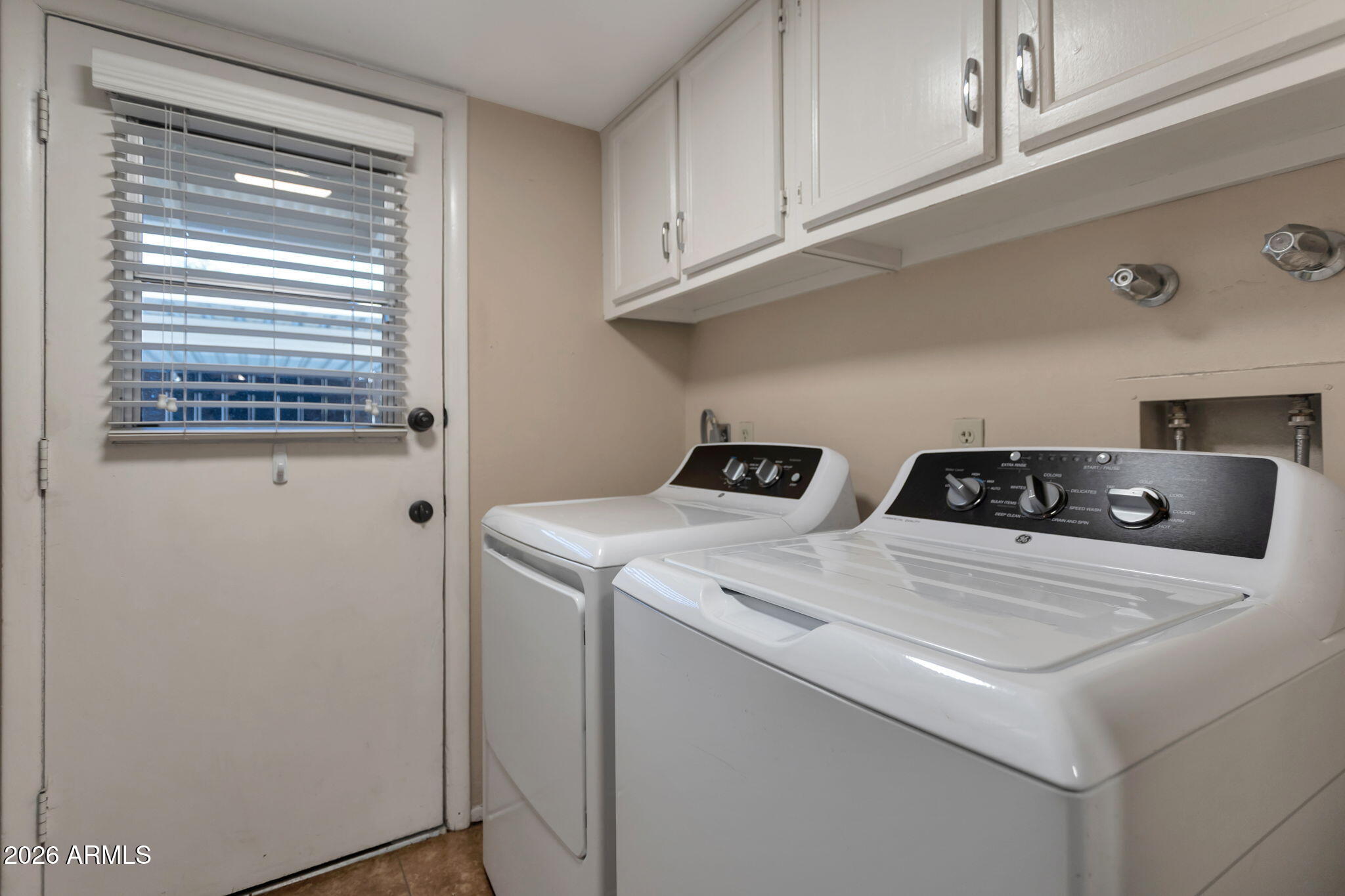 6540 North 7th Avenue, Unit 42 Phoenix, AZ 85013 - Photo 14 of 18 a utility room with dryer and washer