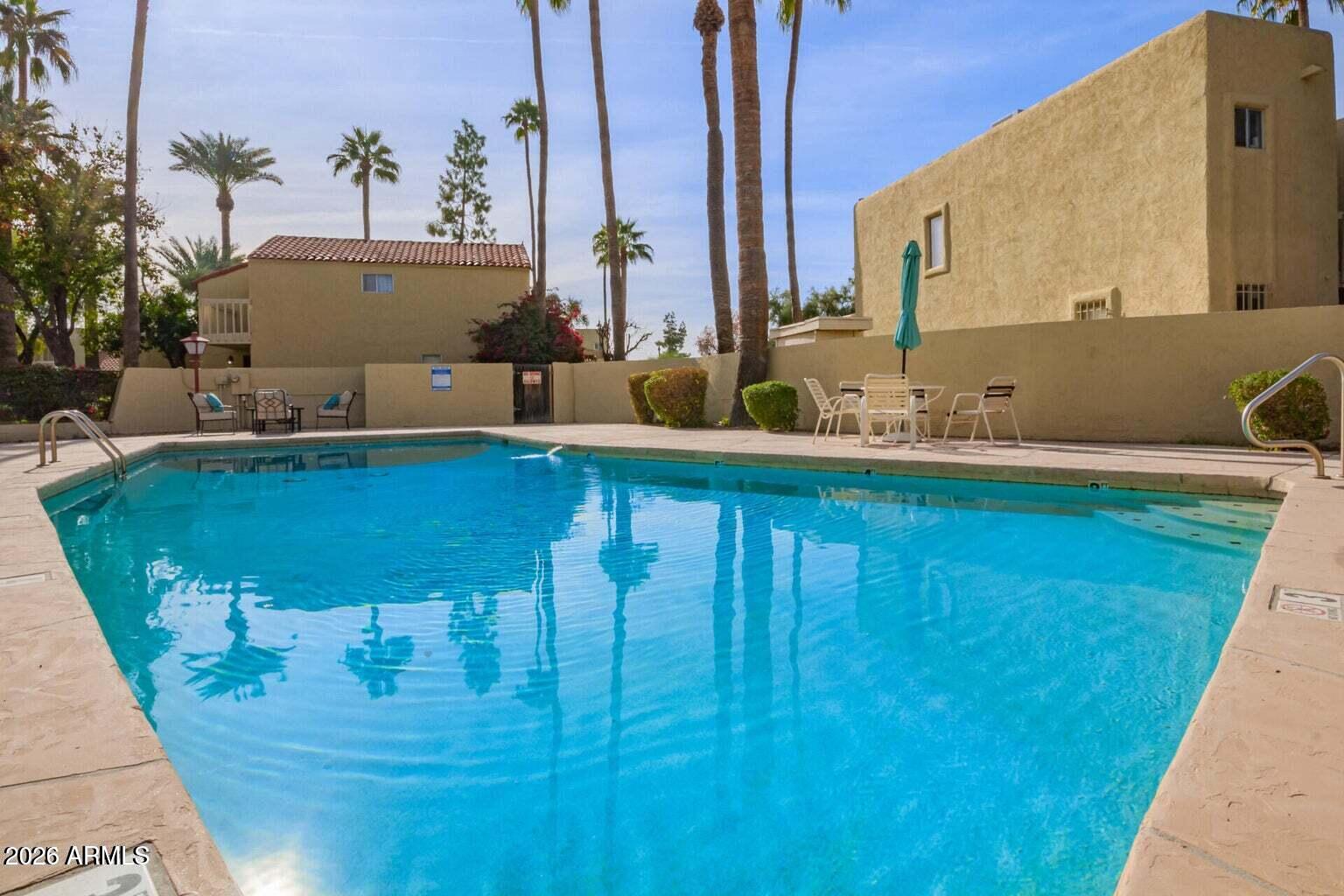 6540 North 7th Avenue, Unit 42 Phoenix, AZ 85013 - Photo 18 of 18 a view of swimming pool with a yard