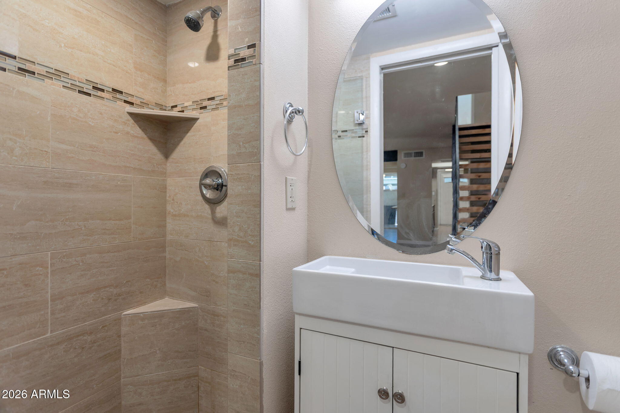 6540 North 7th Avenue, Unit 42 Phoenix, AZ 85013 - Photo 8 of 18 a bathroom with a sink and mirror