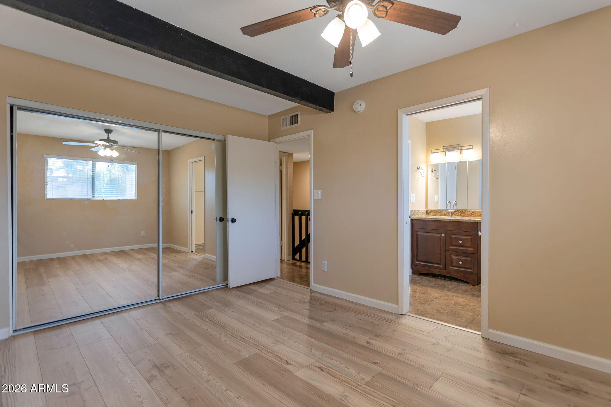 6540 North 7th Avenue, Unit 42 Phoenix, AZ 85013 - Photo 9 of 18 a view of an empty room with a bathroom