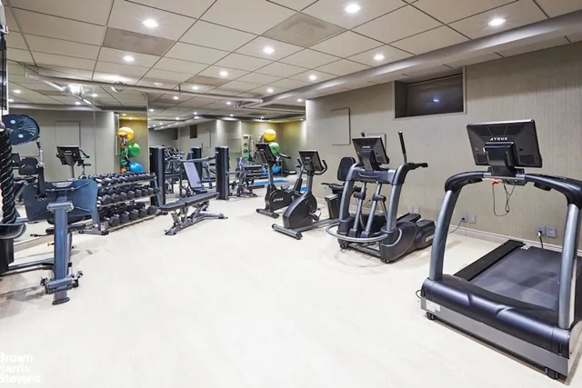 a view of a room with gym equipment