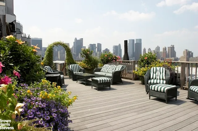 a view of a chairs and table on the terrace