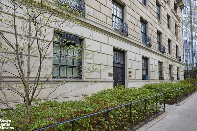 a sign on a brick building