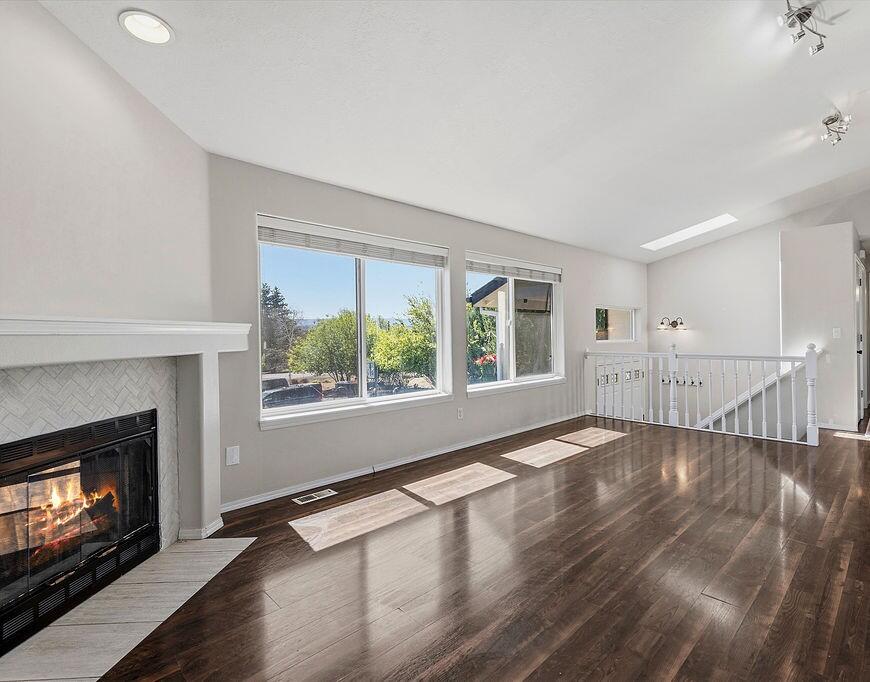 2979 Northeast Sugar Pine Road Prineville, OR 97754 - Photo 11 of 31 a view of an empty room with wooden floor and a window