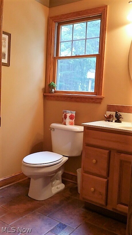 2304 Coon Road Akron, OH 44321 - Photo 10 of 35 Powder room sits off garage entrance