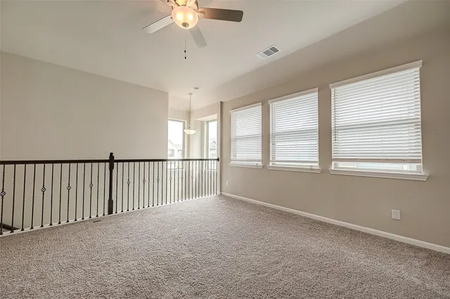 a bathroom with a sink a shower and a mirror