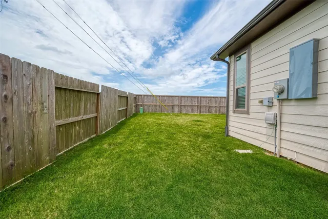a view of a backyard with a garden