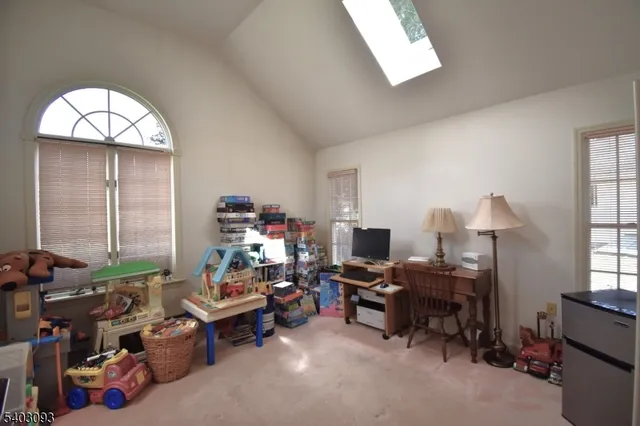 a room with furniture and a window