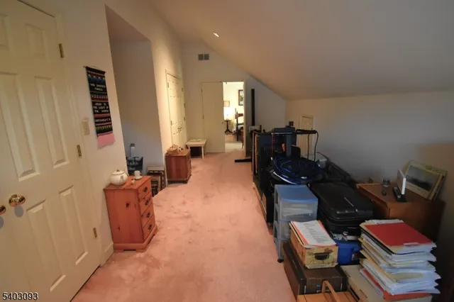 a bed room with furniture and a window