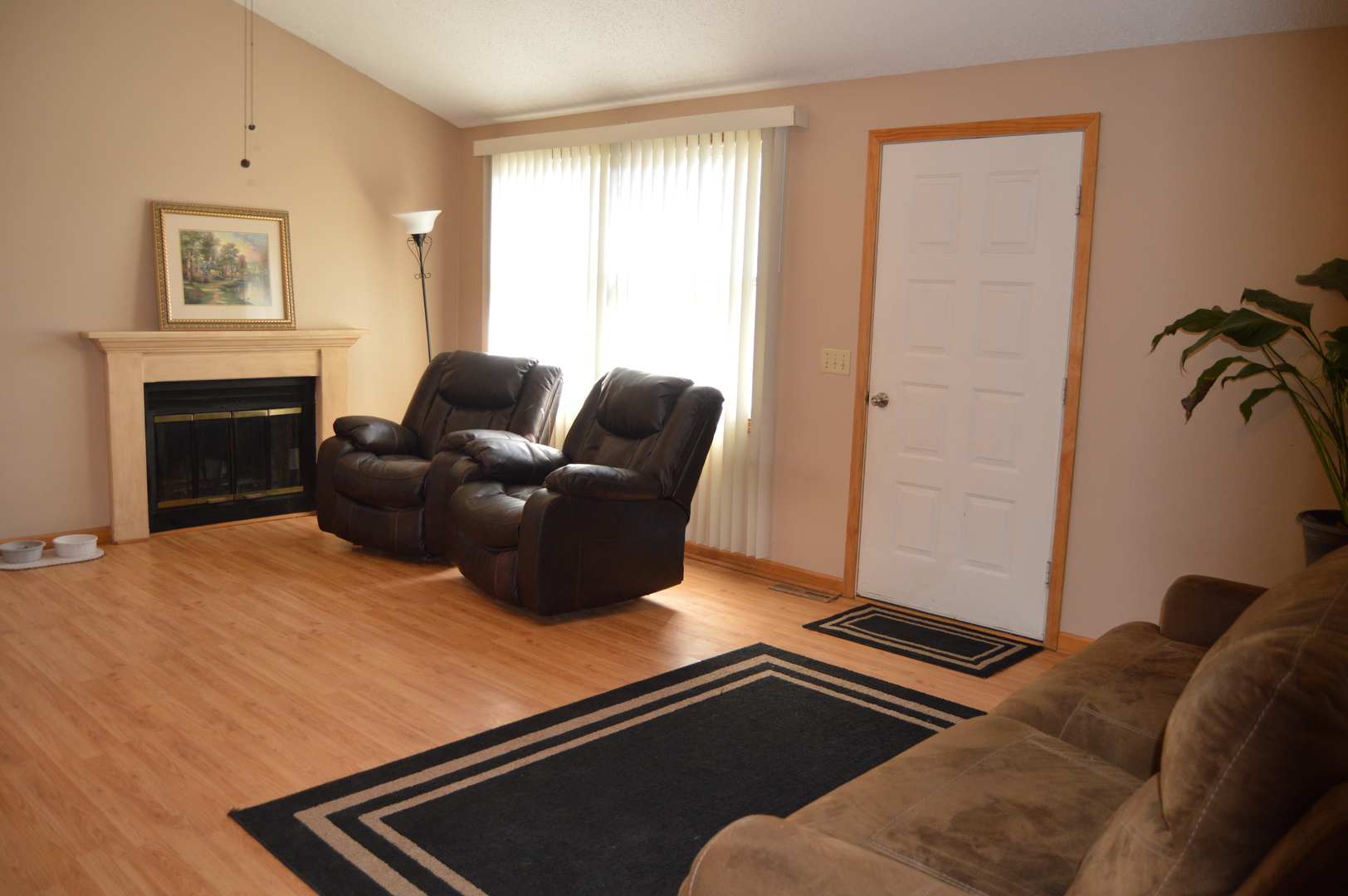 1260 Deerpath Drive Morris, IL 60450 - Photo 2 of 13 a living room with furniture and a fireplace