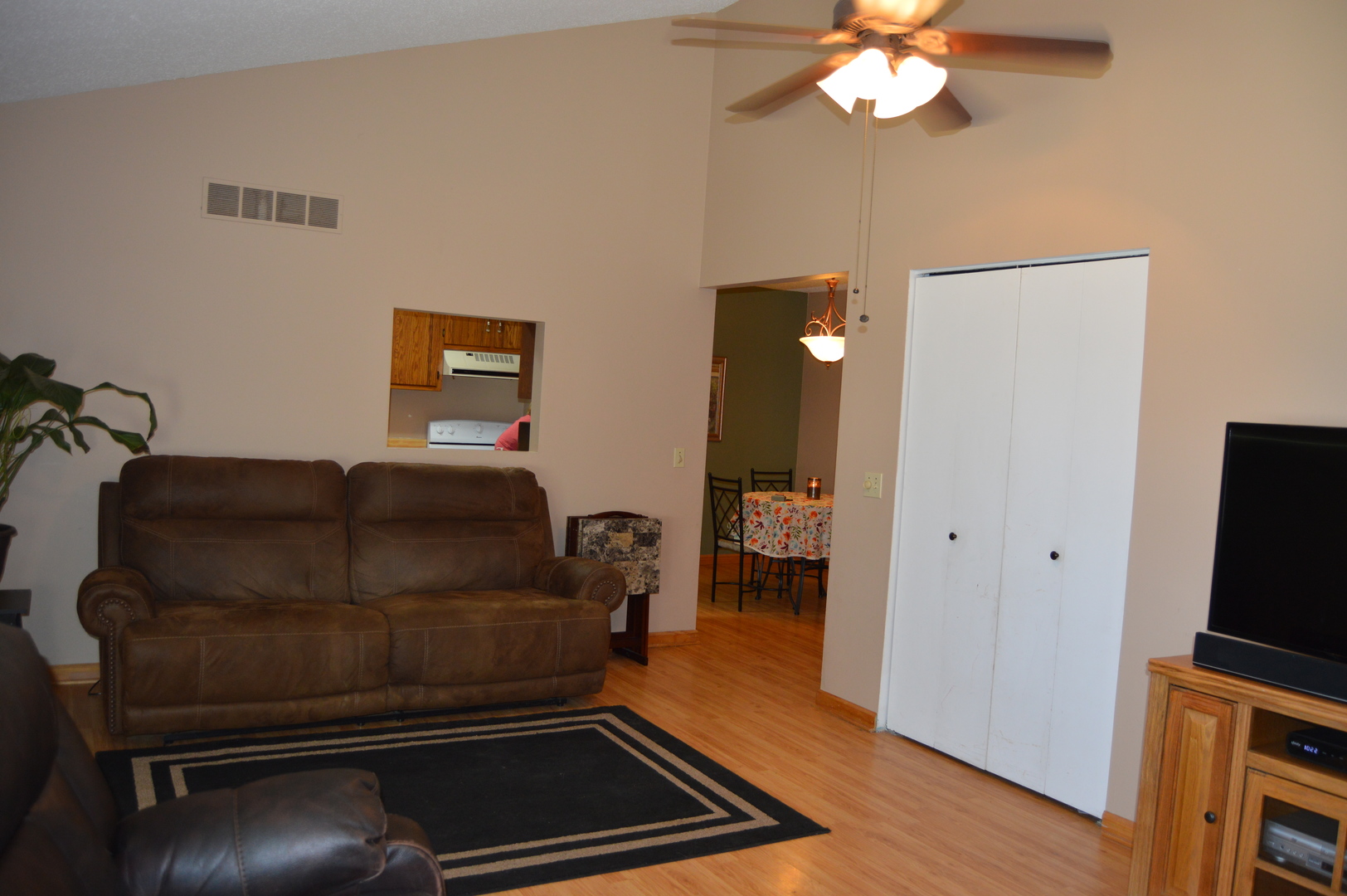 1260 Deerpath Drive Morris, IL 60450 - Photo 4 of 13 a living room with a bed furniture and a flat screen tv