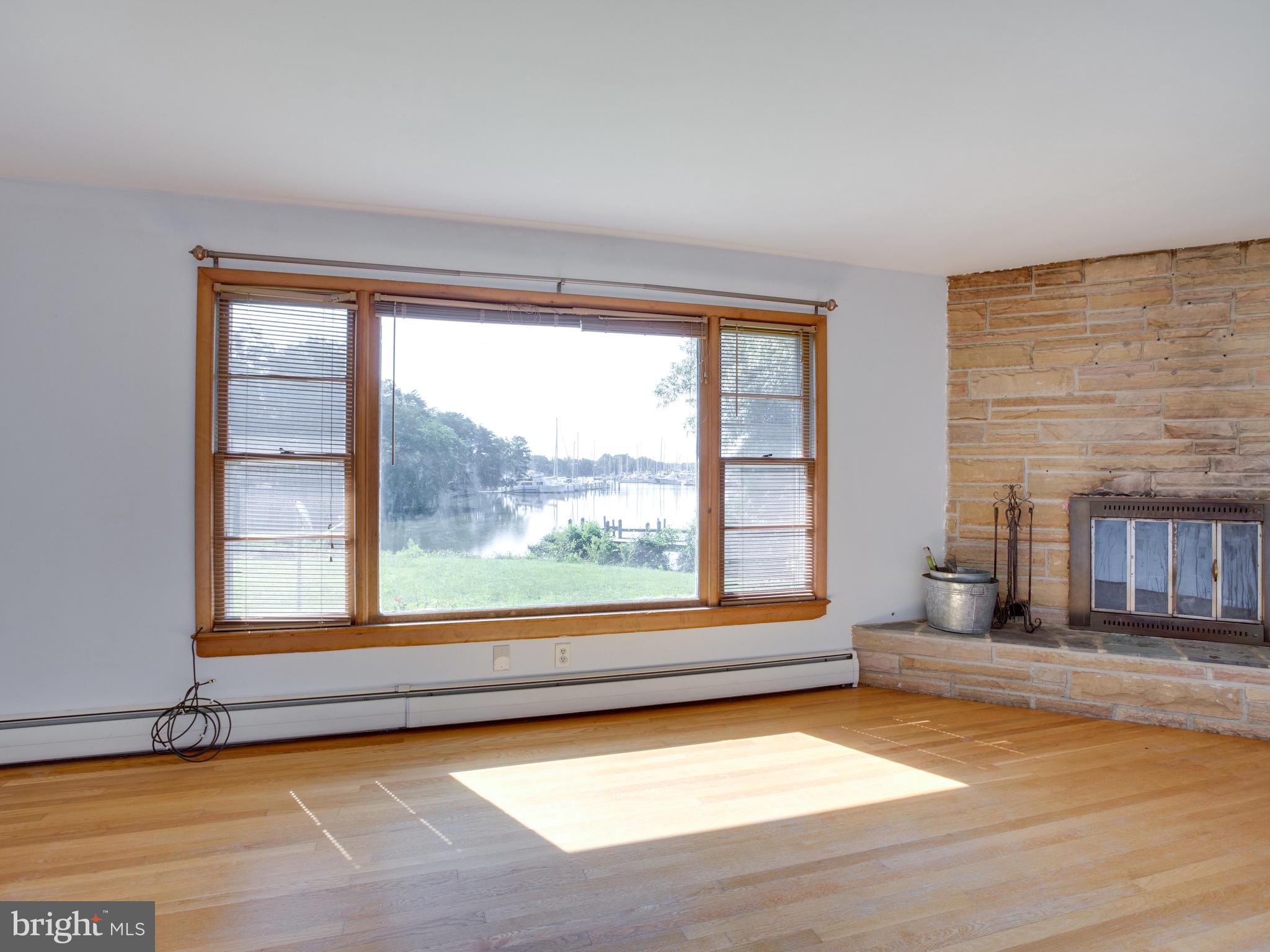 13750-h G H G Trueman Road Solomons, MD 20688 - Photo 13 of 48 family room with fabulous view