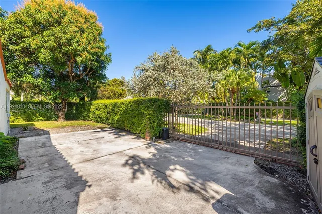 a view of a backyard with a trees