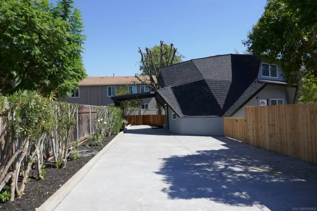 a house with trees in front of it
