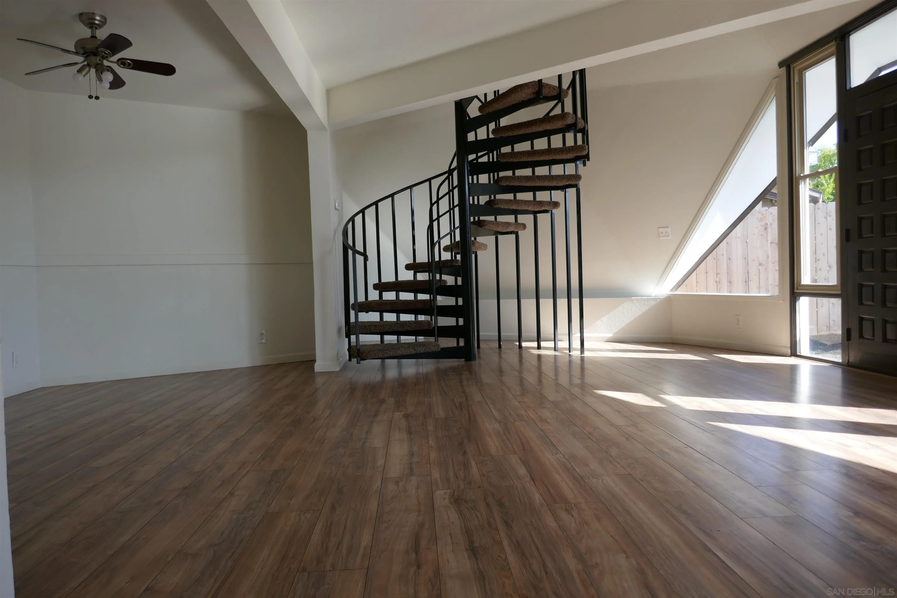1015 Oro Street El Cajon, CA 92021 - Photo 5 of 14 wooden floor in an empty room with a window