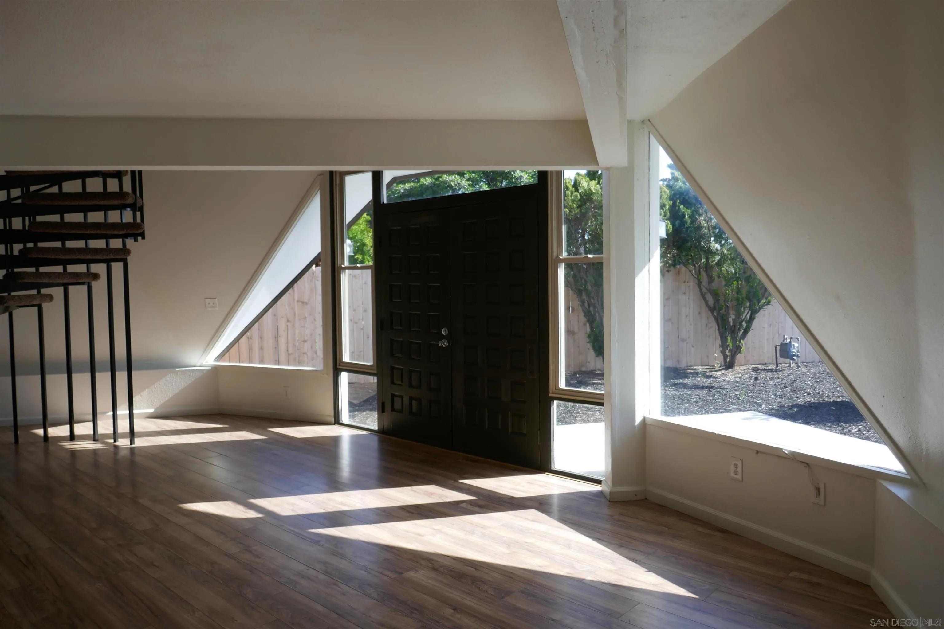 1015 Oro Street El Cajon, CA 92021 - Photo 6 of 14 a view of entryway with wooden floor and door