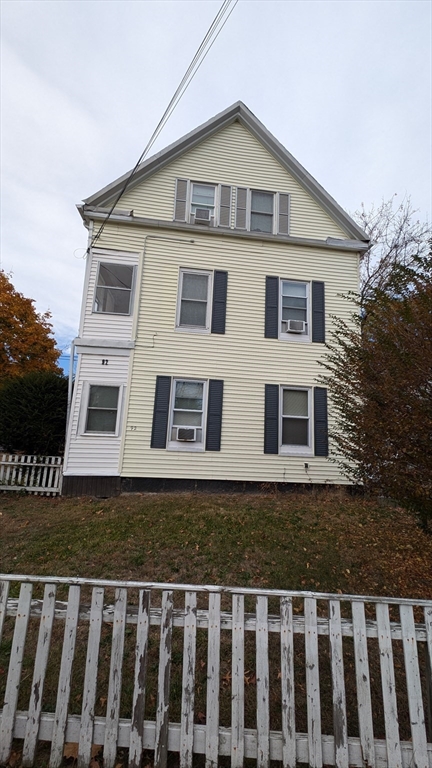 92 North Franklin Street, Unit 1 Holbrook, MA 02343 - Photo 1 of 25 a front view of a house with a yard