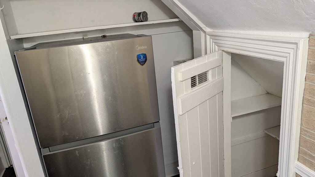 92 North Franklin Street, Unit 1 Holbrook, MA 02343 - Photo 15 of 25 a close view of a refrigerator in kitchen