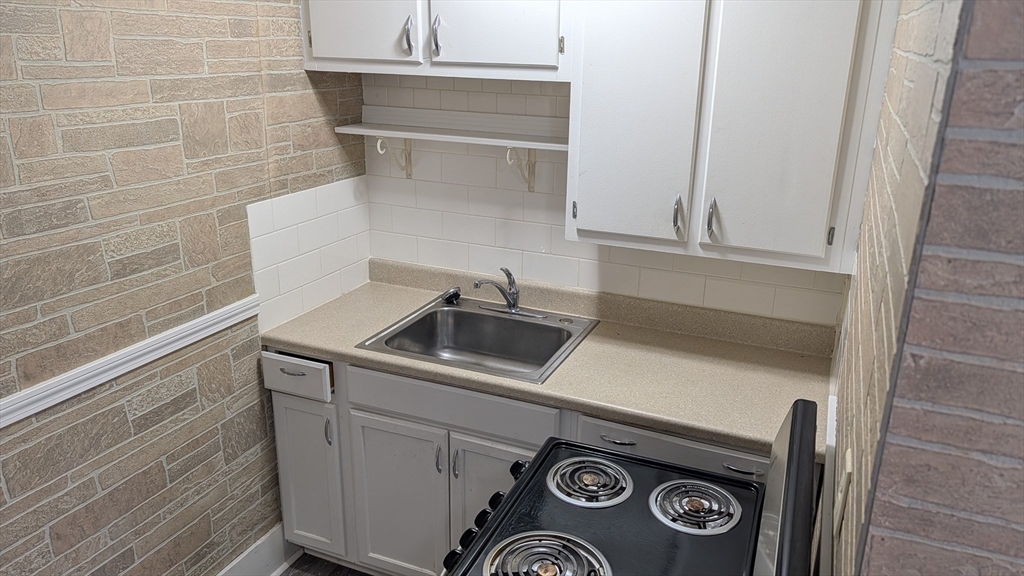 92 North Franklin Street, Unit 1 Holbrook, MA 02343 - Photo 16 of 25 a utility room with dryer and washer