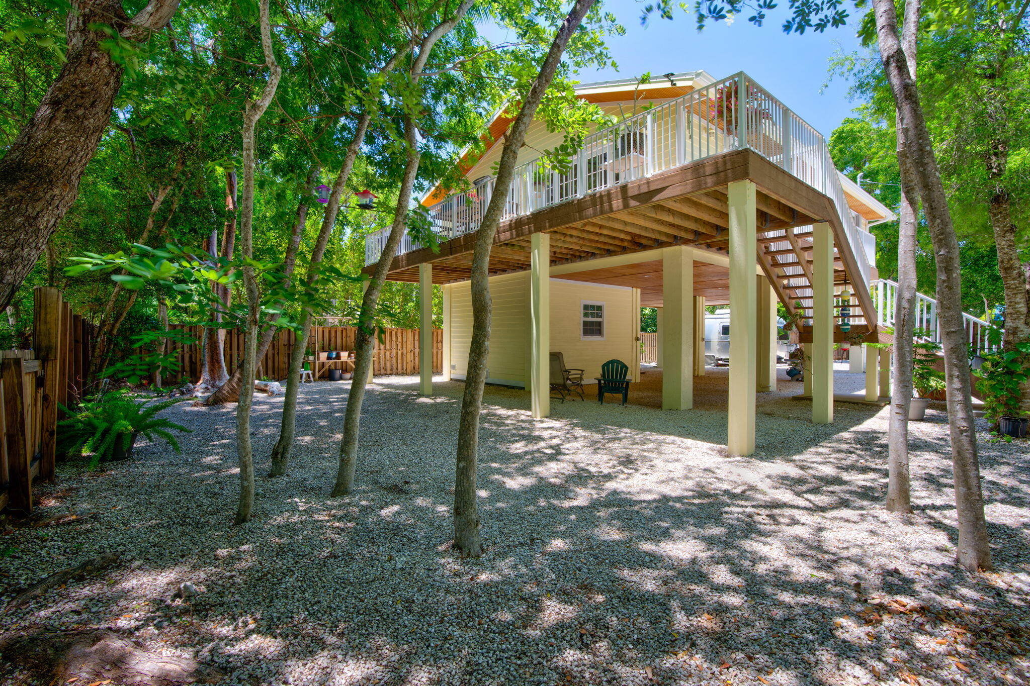 125 South Rolling Hill Road Tavernier, FL 33070 - Photo 32 of 48 a view of a house with a yard