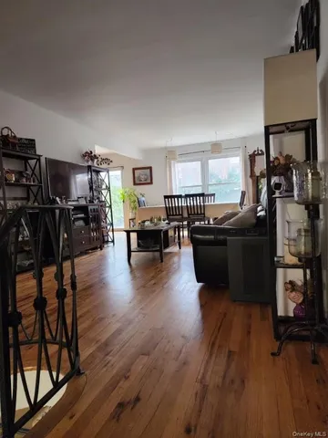 a view of a living room and dining room