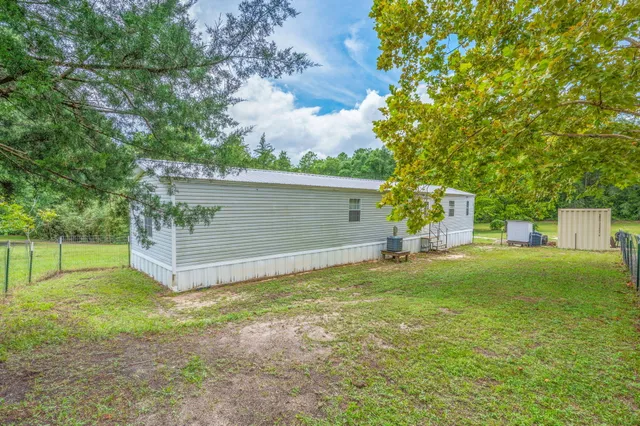 a view of a backyard with a garden