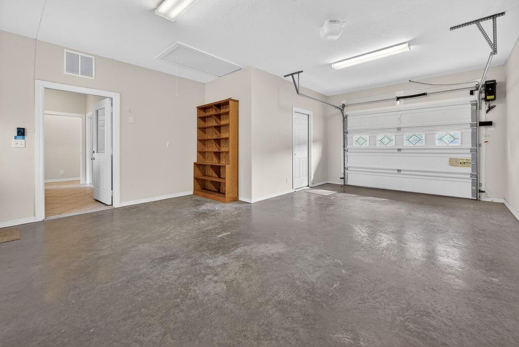 2436 Lakefront Shores Road Athens, TX 75752 - Photo 23 of 32 a view of an empty room with closet and a window
