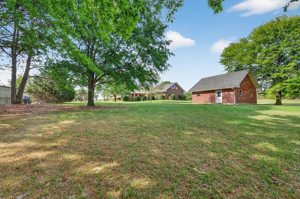 2436 Lakefront Shores Road Athens, TX 75752 - Photo 29 of 32 a view of a house with yard and tree s