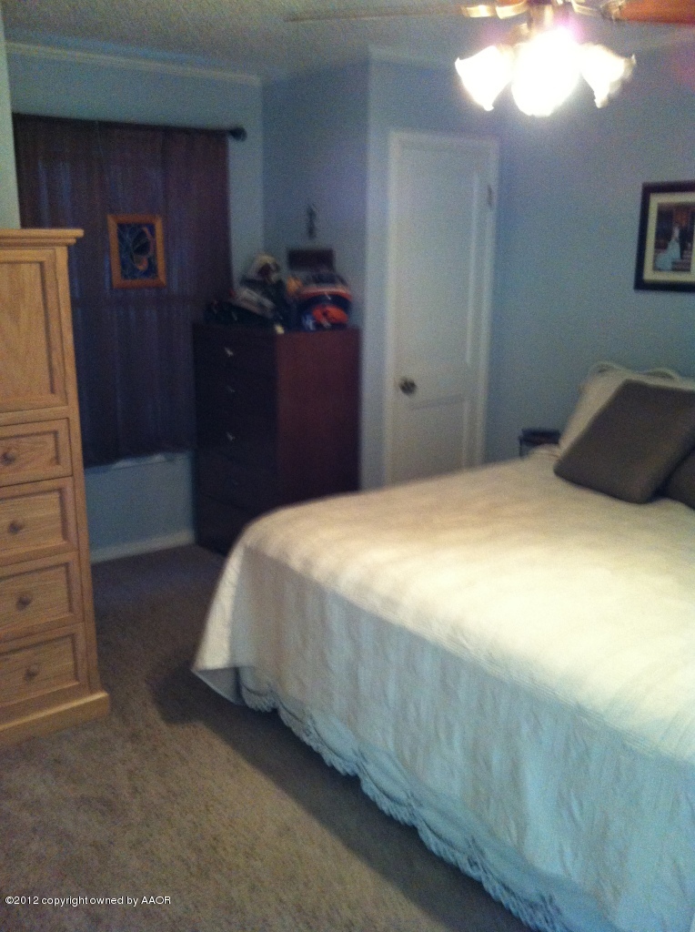 4108 South Hughes Street Amarillo, TX 79110 - Photo 8 of 11 Master bedroom
