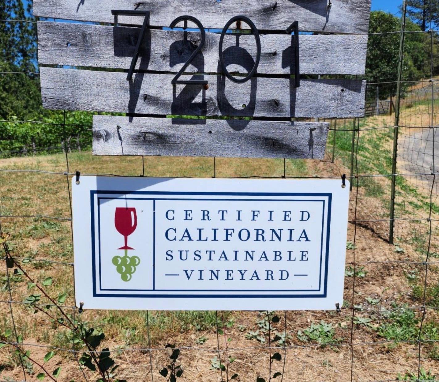 7201 Happy Valley Road Somerset, CA 95684 - Photo 4 of 75 The "Certified California Sustainable Vineyard" sign is prominently displayed on the fence of the entrance. The seller's went through years of painstaking work to qualifying for this prestigious certification.